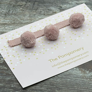 This is our plain blush pompom trim on matching braid sample card