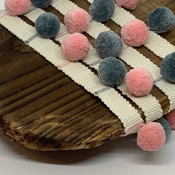 Denim and candy pink pompom trim on plain braid
