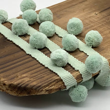 Load image into Gallery viewer, This is our plain sea foam pompom trim on matching braid
