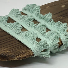 Cargar imagen en el visor de la galería, This is our plain sea foam fan edge trim on matching braid
