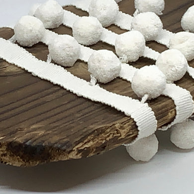 Ivory Pompom trim on plain braid
