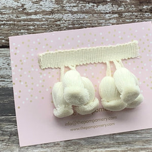 This is our plain ivory triple onion trim on matching braid sample card