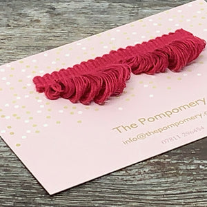This is our plain cranberry fan edge trim on matching braid Sample card