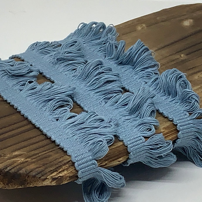 This is our plain country blue fan edge trim on matching braid