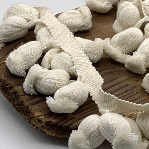 This is our plain ivory triple onion trim on matching braid