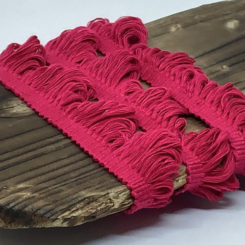 This is our plain cranberry fan edge trim on matching braid