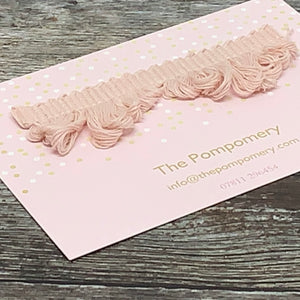 This is our plain faded rose fan edge trim on matching braid Sample card