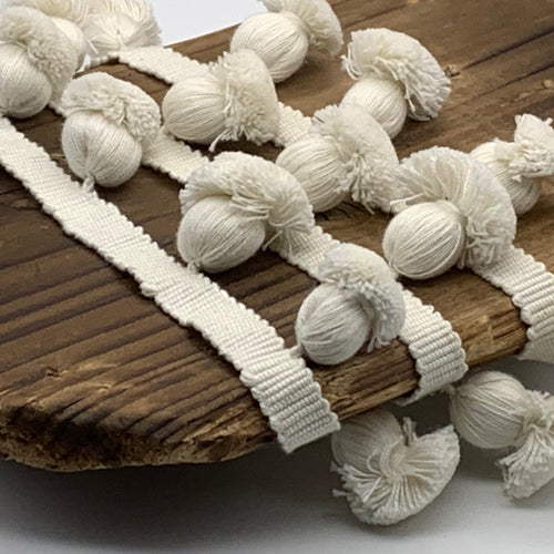 This is our plain ivory onion trim on matching braid