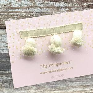 This is our plain ivory onion trim on matching braid Sample card