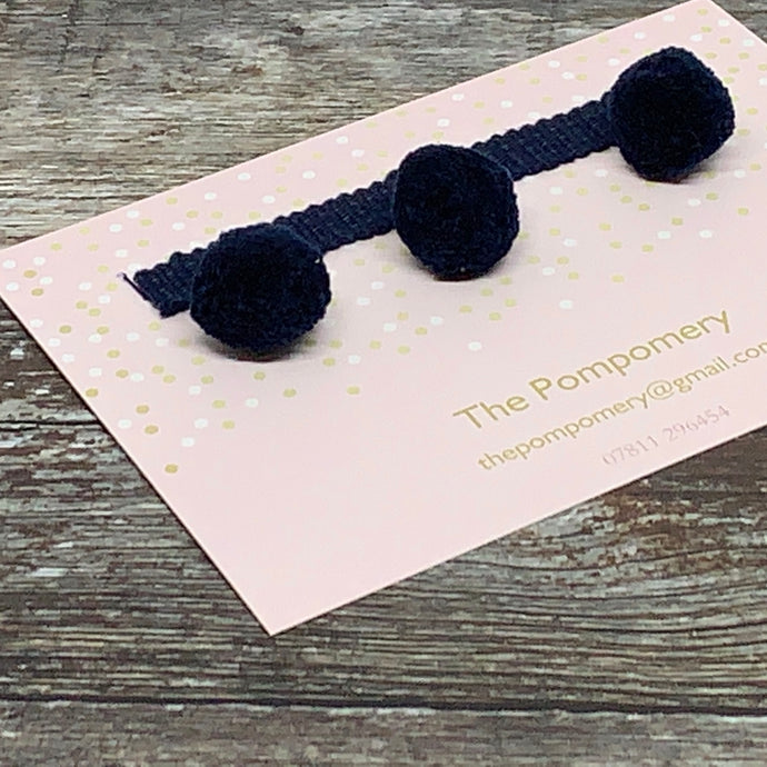 Navy plain pompom with navy braid sample card